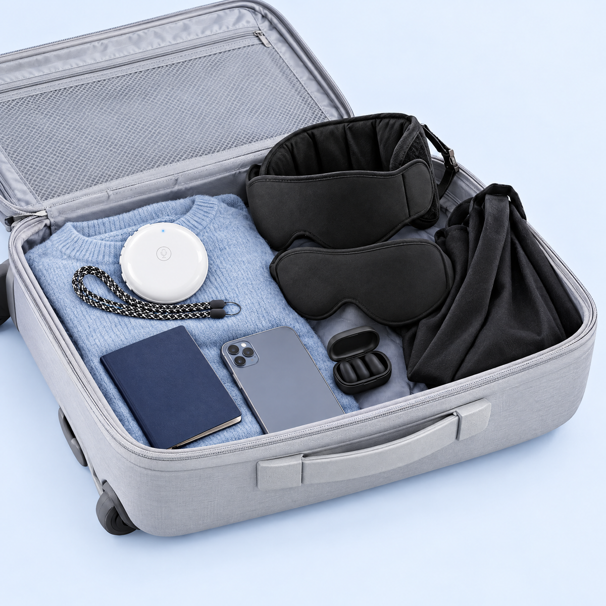Carry-on packed with the SnoozeNest travel sleep set and the CrewTalk AI translator